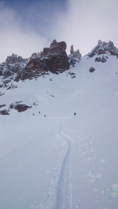 touring up below granite spires.